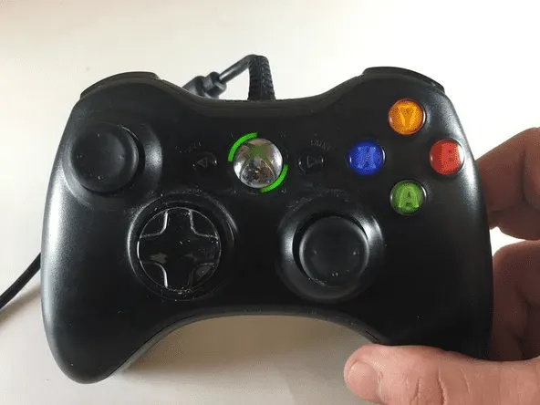 Image of an Xbox controller with loose cables and poor connectivity. 